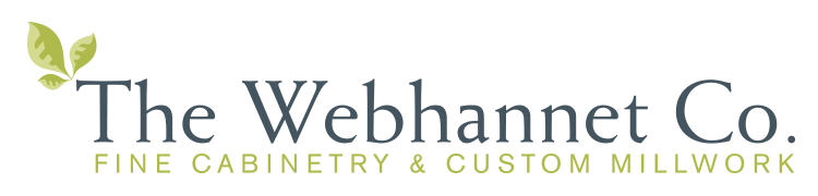 Logo of the Webhannet Co. featuring stylized text and a green leaf, emphasizing their focus on fine cabinetry and custom millwork for home remodeling in Maine.